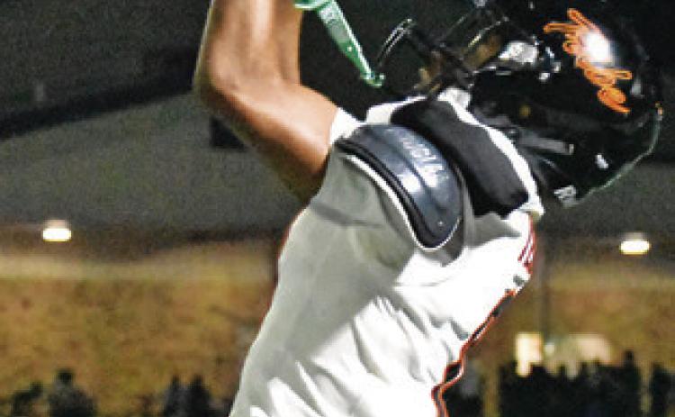 JAILLE DEERE makes a critical catch against Bartlett last Friday in Bartlett. Tribune photo by Roy Sanders