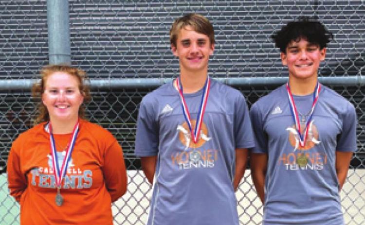 CALDWELL TENNIS players Neva Cravens, Waylon Chapman and Adolfo Gaucin advanced to regionals after competing in the District 19- 3A Tennis Tournament last Thursday. Gaucin won the boys’ singles title, and Cravens and Chapman placed second in Mixed Doubles.