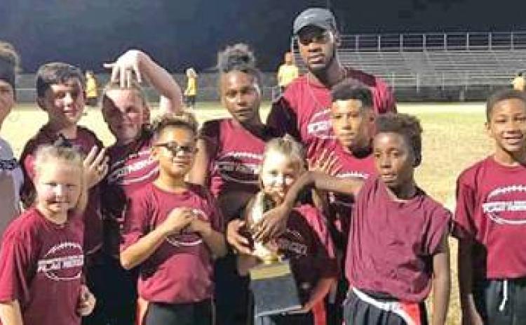 SUPER BOWL CHAMPS for Somerville Youth Sports are the Alabama Crimson Tide. They include, front row, from left, Audrey Schoenberg, Serenity Leverette, Ryann Ricci, Greg Shingleton, Kevin Gaines; and back row, from left, Jennifer Mader, Nicholas Connely, Kieleigh Connely, Kemorah Cooper, Dawud Majied and Elijah Lauderdale.