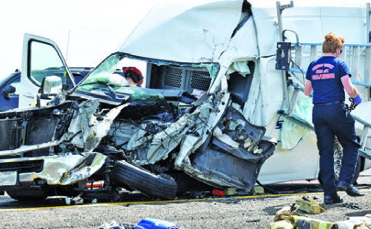 THIS VAN WAS damaged on Monday in an accident on State Highway 21 West near County Road 110. -- Tribune photo by Roy Sanders