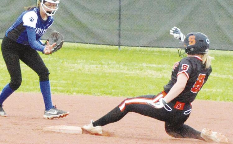 SOMERVILLE’S JALYNN URBANOSKY slides into second base during the Somerville-Bartlett game at the Lady Yegua Softball Tournament last Friday morning at Lady Yegua Field. -- Tribune photo by Denise Squier