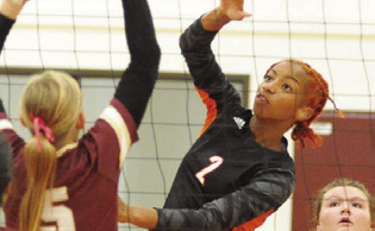 SOMERVILE’S RA’MAYA CARTER gets one of her 14 kills against Milano last Friday night. -- Tribune photo by Denise Squier
