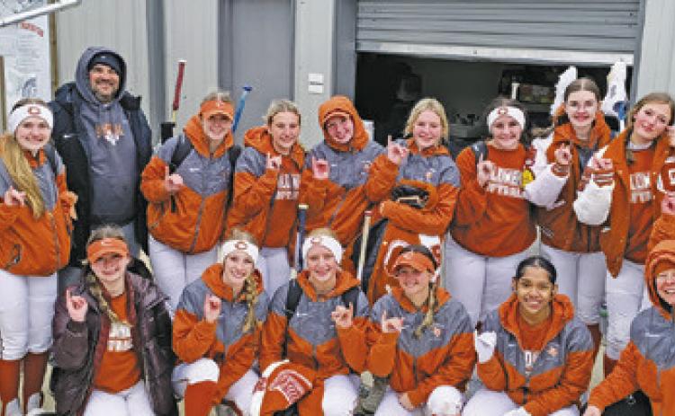 THE LADY HORNETS CELEBRATE their win over Tidehaven on Saturday after a cold day at Lady Hornet Field. Caldwell was one of the sites for the 2024 Texas High School Softball Leadoff Classic which was put on by the National Fastpitch Coaches Association.