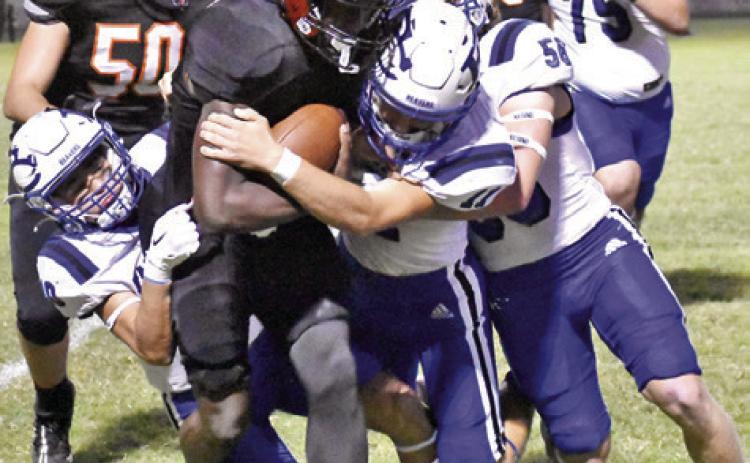 KEITH CRAWFORD OF Somerville carries the ball against Falls City. Somerville lost to the Beavers 33-22. -- Tribune photo by Roy Sanders