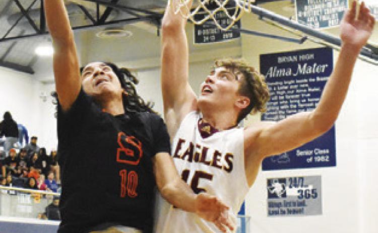 GARDNER SHIVERS of Somerville shoots against Milano. The Yeguas lost the area game 60-49. Tribune photo by Roy Sanders