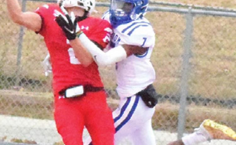DESHUN HAMILTON breaks up Christoval’s pass attempt during Snook’s third round playoff loss. -- Tribune photo by Denise Hornaday