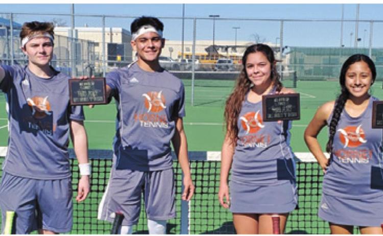 THE CALDWELL VARSITY tennis team participated in the Bastrop Winter Cup on Friday, Jan. 24. Placing third in boys doubles were Luke Chaplin and Adolfo Gaucin, and placing third in girls doubleswere Skylinn Johnson and Aletza Torres.