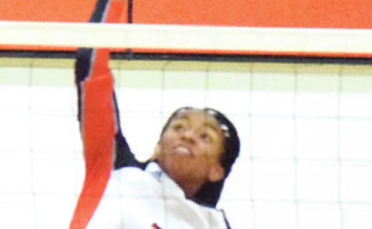 RA’MAYA CARTER jumps to hit the ball during the Somerville-Richards match last week.