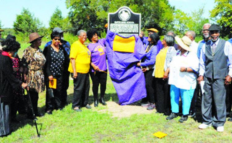 SMITH HIGH SCHOOL ALUMNI unveil the new Texas Historical Marker for Smith High School at last Saturday’s dedication ceremony. -- Tribune photo by Denise Squier