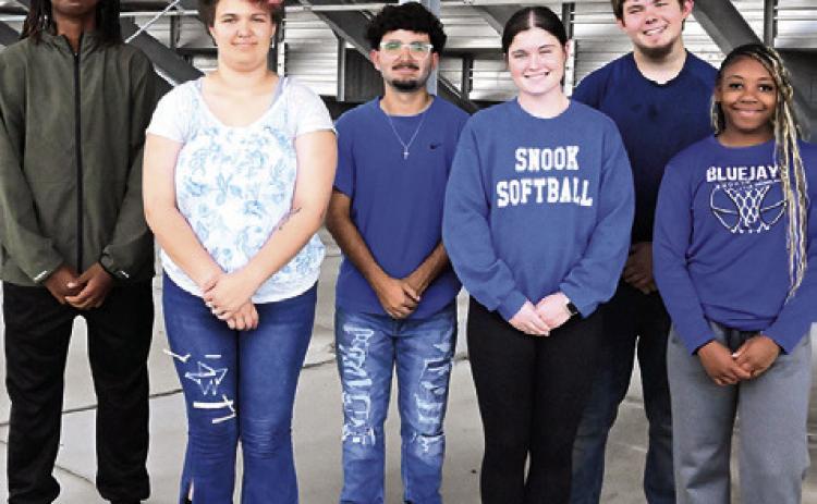 SNOOK HIGH SCHOOL recently announced its homecoming royalty. Pictured, from left, front, are queen hopefuls, Aeraellyne Adams, Kalyn Cooper and Braynija Pool, and, back, king hopefuls, John Carr, Conner Gillam and Jensen Weaver-Jakubik. Tribune photo by Denise Squier