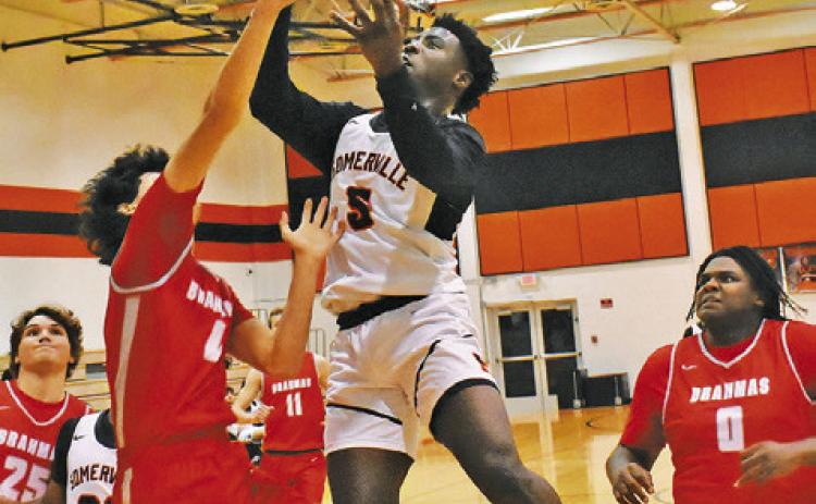 SOMERVILLE’S KEITH CRAWFORD takes a shot against Bellville. See story inside.