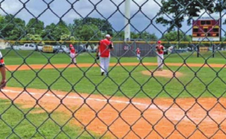 THE DEANVILLE REDS 10U Pony League baseball team played in the Mustang 10U Zone Tournament last week. The team is pictured warming up for its game against La Porte Orange on Thursday.