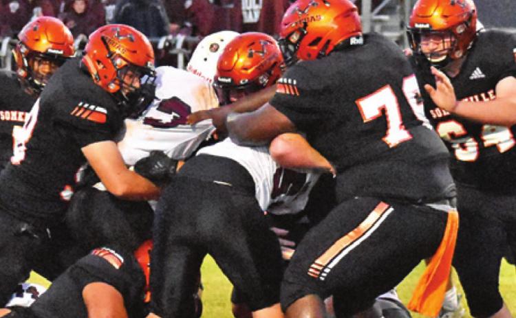 THE SOMERVILLE YEGUAS defense makes a tackle against Iola last Friday in Somerville. The Yeguas improved to 3-3 overall.