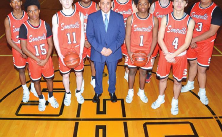 SOMERVILLE TEAM MEMBERS include, front row, from left, Verkobe Woodberry, Garrison Ballard, Head Coach Billy Ramey, Arvis Burns and Johnny Legg; back row, Brandyn Carter, Caden Espinosa, Jaret Pickerton and Jesus Espinoza. -- Tribune photo by Roy Sanders