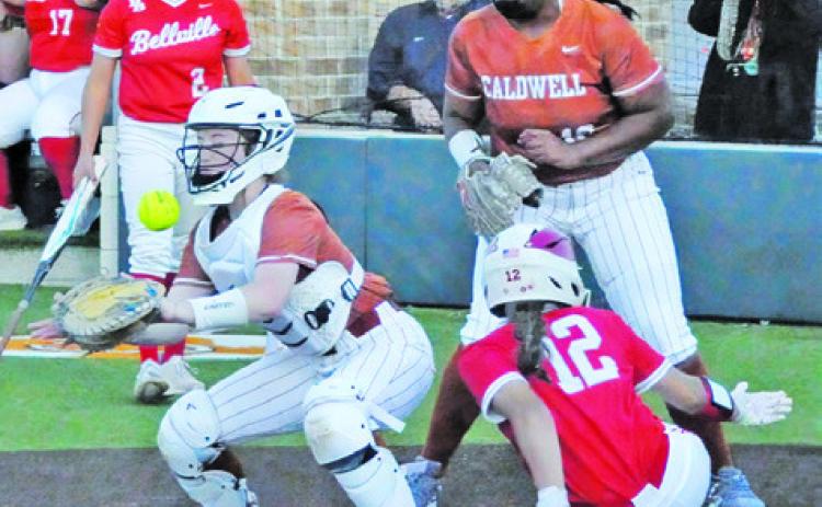 THE BALL APPROACHES THE plate during the Caldwell’s district opener against Bellville last Tuesday night. Tribune photo by Denise Squier