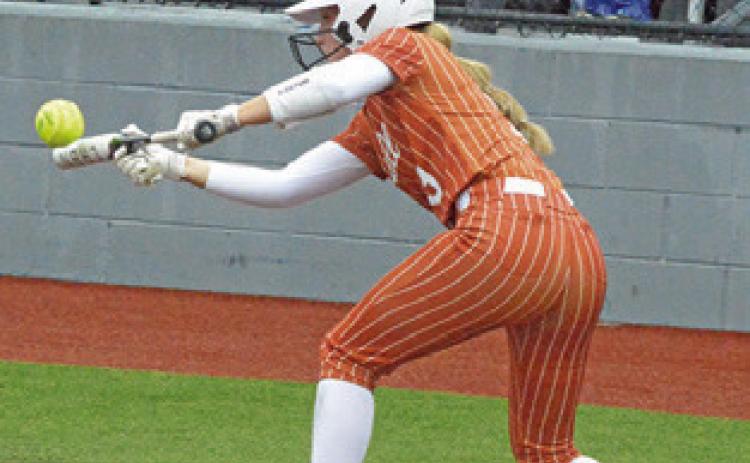 MOLLY MEADOWS bunts during the Caldwell-Robinson area playoff game last Thursday at Georgetown High School. Tribune photo by Denise Squier
