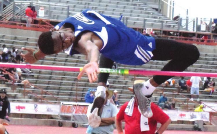 SNOOK’S DESHUN HAMILTON jumps 6 feet 4 inches to finish in fourth place in the boys Class 2A high jump at the UIL State Track and Field Meet in Austin last Friday. -- Tribune photo by Denise Squier