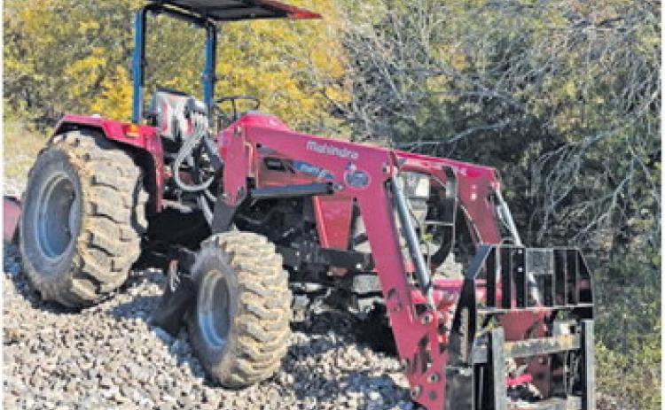 THIS STOLEN TRACTOR was located and returned to the owner.