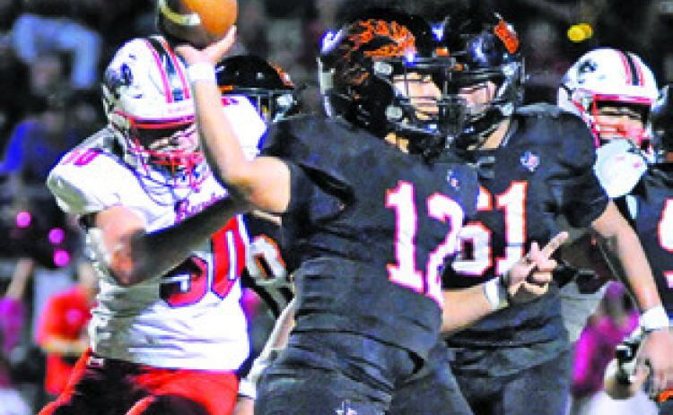 SOMERVILLE QUARTERBACK Andy Espinoza throws the ball against Burton in 2026. Tribune photo by Denise Squier