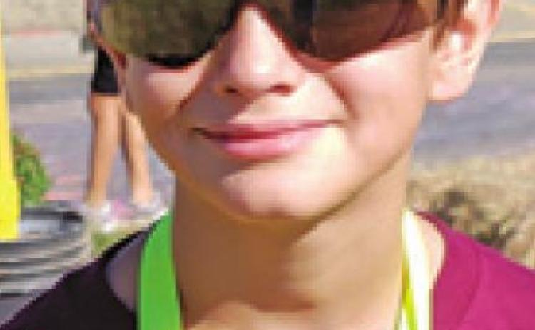 GAVIN MORENO of Caldwell placed fourth in the annual Sunflower Run.