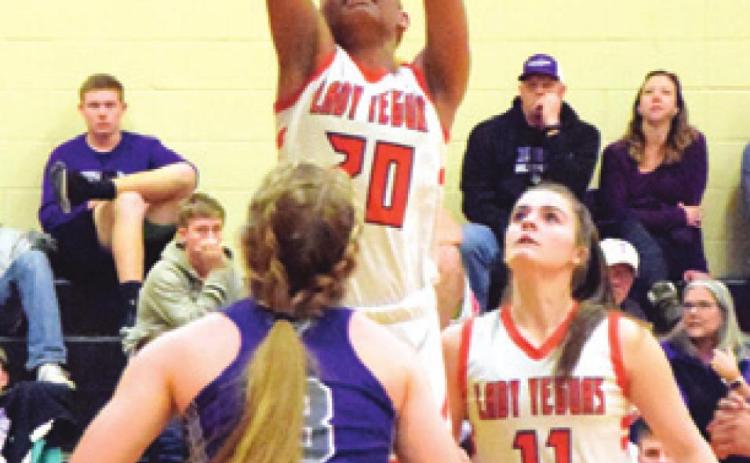 XADRIA MARTIN shoots the ball during the Lady Yeguas’ bi-district playoff win over Thrall. -- Tribune photo by Denise Hornaday