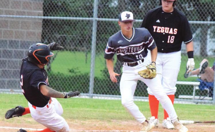 SOMERVILLE’S JEREMIAH TEAGUE slides into home plate as teammate Cullen Sablatura looks on. The Yeguas lost to Fayetteville. -- Tribune photo by Denise Squier