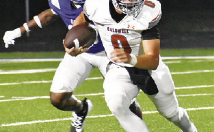 COY BECKA of Caldwell breaks lose for another run against Crockett.