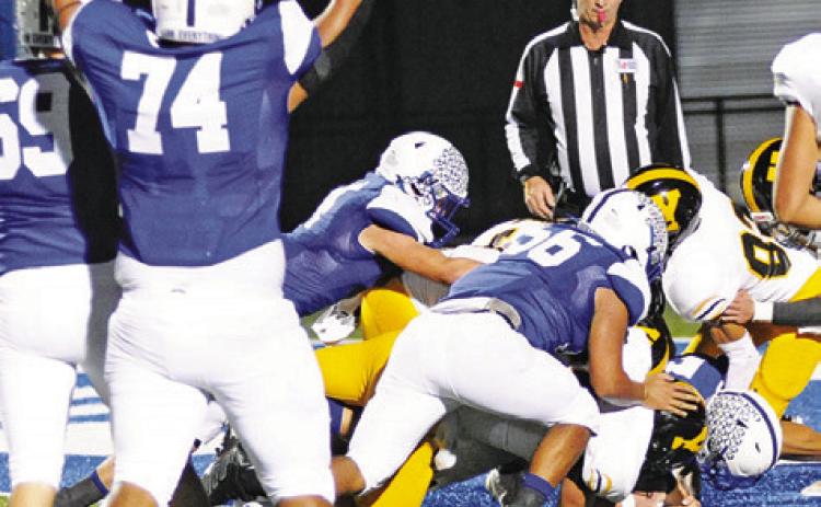 J. BEAUX HRUSKA runs for a score as Gabe Martinez raises his hands signaling touchdown. -- Tribune photo by Denise Squier