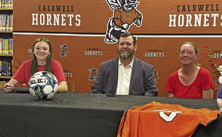 CALDWELL LADY HORNET soccer player Cadie Coston recently signed her letter of intent to continue her soccer journey at Hill College in Hillsboro. Last season, the Lady Rebels were 13-3-2 overall and a perfect 7-0 in conference play, including a trip to the NJCAA DI Women’s Soccer Championship. -- Photo courtesy of Tammie Novosad, CISD