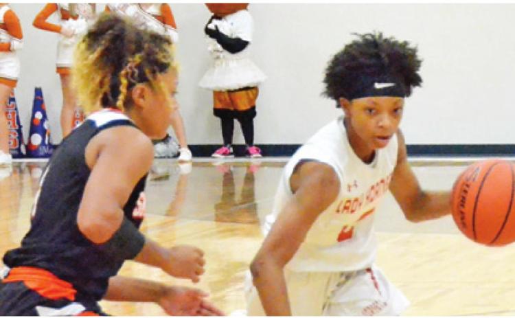 CALDWELL FRESHMAN POINT guard Ja’Asia Mathis led Caldwell in scoring against Smithville in Friday’s night home game with 18 points. The Lady Hornets lost 49-46. -- Tribune photo by Roy Sanders