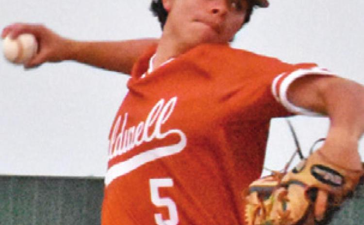IAN REYES hurls this pitch for Caldwell.