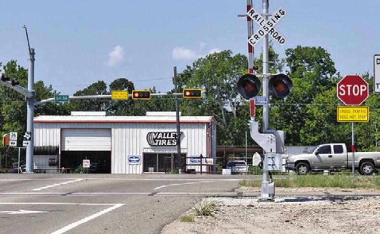 THE INTERSECTION AT F.M. 60 East and State Highway 36 South, as seen from F.M. 60. Work continues on a traffic signal.