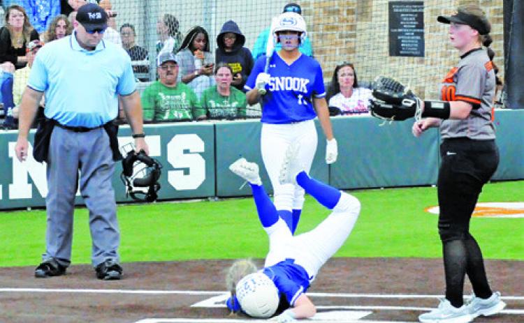 SNOOK’S KYLIE PRICE slides head first safely into home during the Lady Jays’ bi-district win over Centerville last Friday night at Lady Hornet Field in Caldwell. -- Tribune photo by Denise Squier