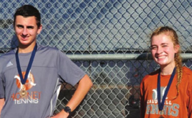 CALDWELL’S GABE Pipes and Jackie Pinkerton won the mixed doubles consolation title at the Madisonville Junior Varsity Tennis Tournament last Tuesday.