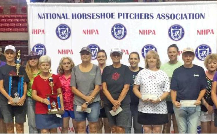 DORIS HIEDEN OF CALDWELL, seventh from the left, placed fourth in the world competition of the National Horseshoe Pitchers Association annual tournament in Wichita Falls. She is also a multiple Texas state champion and will compete again this fall for that title.
