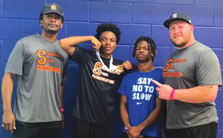 SOMERVILLE’S VERKOBE WOODBERRY placed third in the 132-pound weight division at the Division 3 THSPA Boys’ State Powerlifting Meet in Taylor last Saturday. His teammate Hershel Conway placed seventh in the 123-pound weight class. They are pictured with Assistant Coach Mitchell Leonard and Head Coach Ethan Watson.