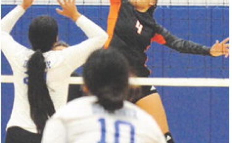 SOMERVILLE’S GABBY JACKSON reaches for the kill during the Lady Yeguas’ win over Dime Box. -- Tribune photo by Denise Squier