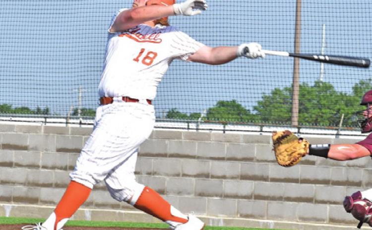 LUCAS PEEL HITS a home run against Fairfield, scoring four runs.