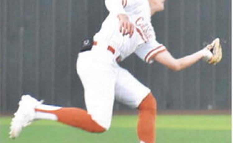 COY BECKA OF Caldwell makes this diving catch for an out against Taylor.