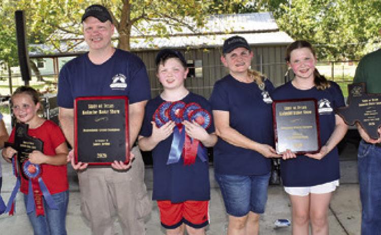 THE KOLACHE FESTIVAL Bake Show grand champions included, from left, Susan Vajdak; Callie Barnes, Olde Towne Kolaches of Houston including Craig Knappick, Carter, Lisa and Chloe Knappick, and Frankie Muehlstein. All were recognized at the awards presentation.