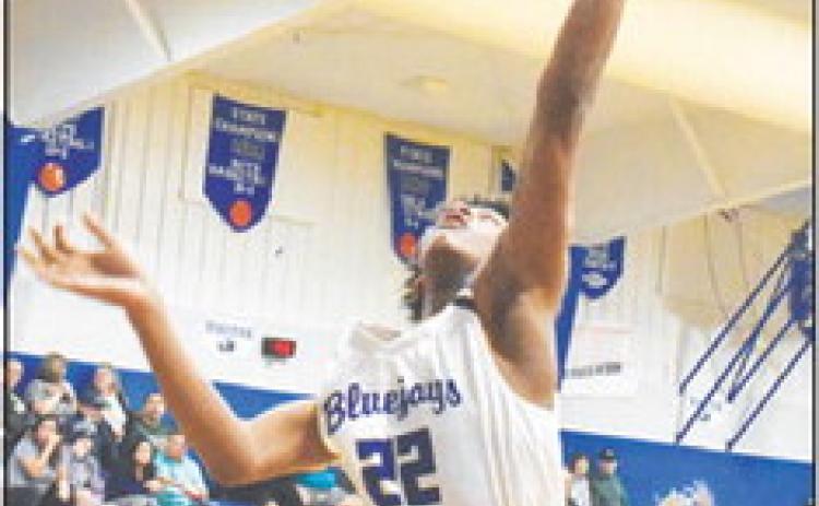 SNOOK’S JIMMY Kearney makes this shot against Valley Mills. The Bluejays lost a close one 54-51. -- Tribune photo by Roy Sanders