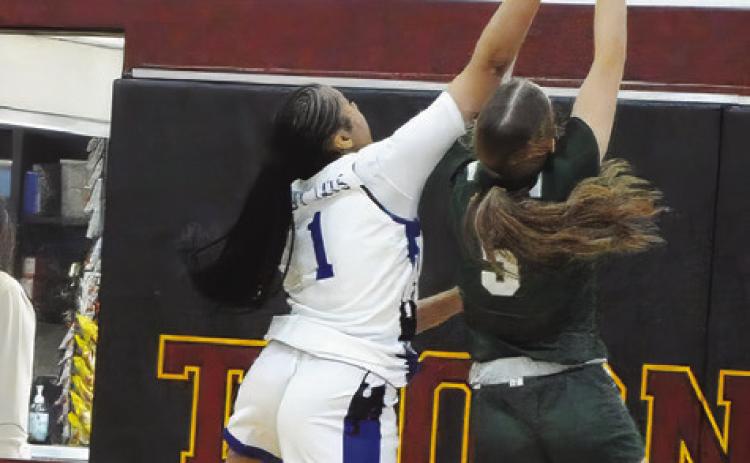 SNOOK’S ALANA STRINGFELLOW blocks a shot by a Valley Mills player during the Thorndale Shootout tournament last Friday. See inside for more about the Lady Jays playing in the tournament. Tribune photo by Denise Squier