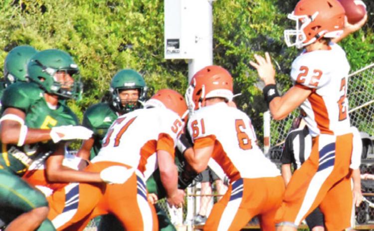 THE CALDWELL HORNETS get ready to pass against Lexington.