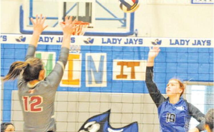 SNOOK’S PAYTON SODOLAK attempts to get the ball past Fayetteville’s Kayme Schley during the Snook-Fayetteville match last week.