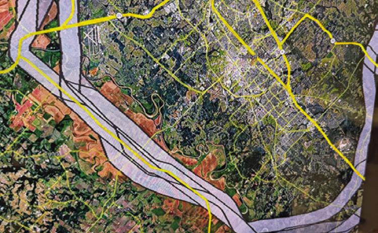 THE PORTION OF I-214 Loop is shown running from State Highway 21 East at the F.M. 50 intersection, top left, crossing F.M. 60 East, middle of the graphic and veering southward and then back east.