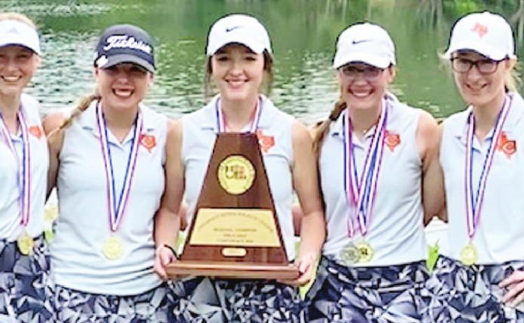 CALDWELL HIGH’S REGIONAL champions display their trophy.