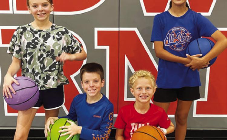 THE CALDWELL COACHING staff recently held its annual basketball camp for third through sixth-grade, and these athletes were selected as the camp’s MVPs and Hornet Award winners: Olivia Zamora, MVP; Ryan Story, MVP; Parker Pride, Hornet Award; Porter Pride, Hornet Award.