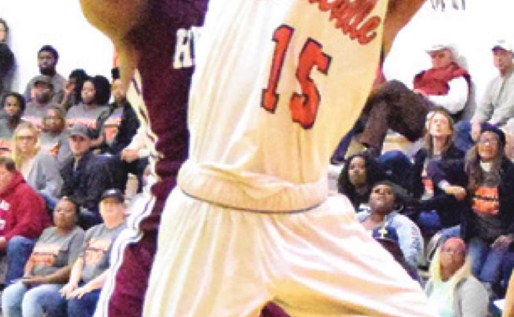 SOMERVILLE’S Verkobe Woodberry’s shot is about to be blocked by Hearne’s Anthony Jackson. -- Tribune photo by Denise Hornaday