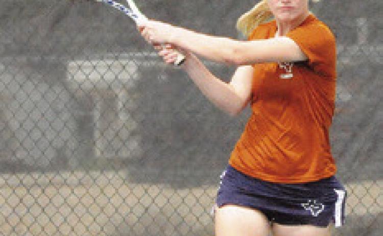 JORDAN PERKKIO returns the ball during the Caldwell Varsity Tennis Tournament last week. Tribune photo by Denise Squier
