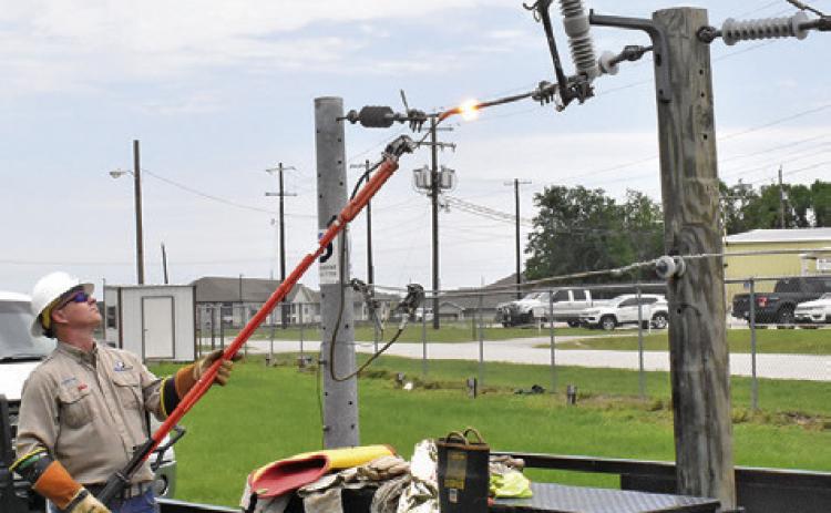 NICK BARTA OF Bluebonnet Electric Cooperative offers a demonstration for fifth-graders at Caldwell, Somerville and Snook on Thursday, May 7, during Burleson County Ag &amp; Health Day at the county fairgrounds. The event was held to teach in multiple settings.